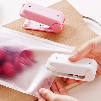 Heat sealer closing a bag of crisps