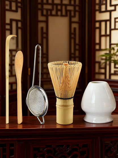 Bamboo matcha whisk and accessories laid out