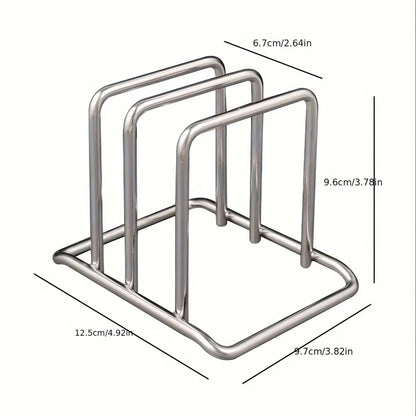 Lid and board rack holding a pan lid and chopping board upright