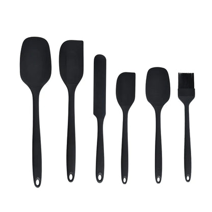 Black six-piece silicone baking utensil set with spatulas, scrapers and pastry brush