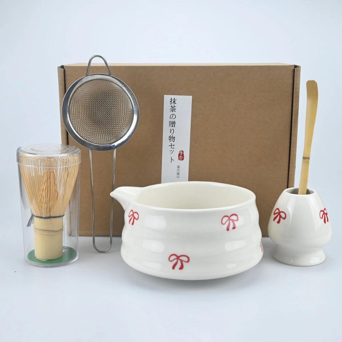 Ceramic matcha bowl with pouring spout and bamboo whisk
