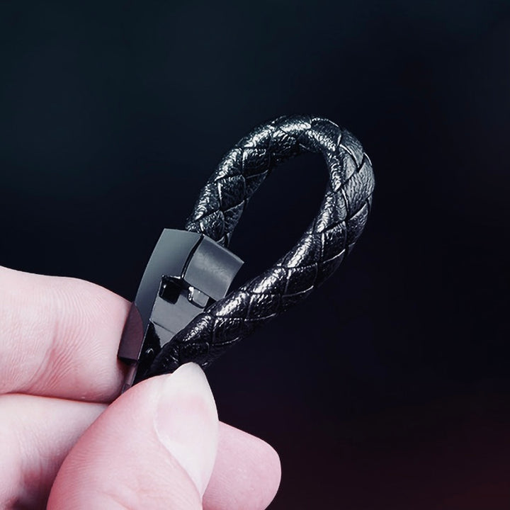 Charging bracelet shown in black, white and red